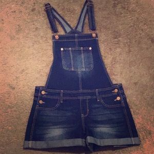 I am selling a very cute short jean romper.